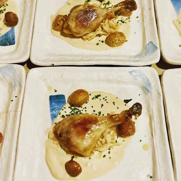 Duck Confit Leg, Poached Baby potatoes, mustard glaze, and sauerkraut