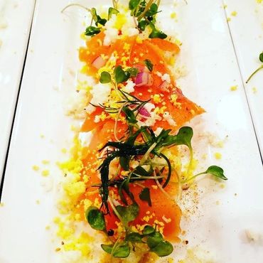 Cured Salmon Gravlax, egg yolk, egg white, gribiche, and baby herbs