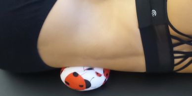 Full body pillow for shoulder and hip support during side sleeping.