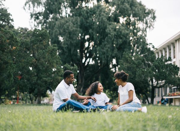 Family sharing a picnic in the park