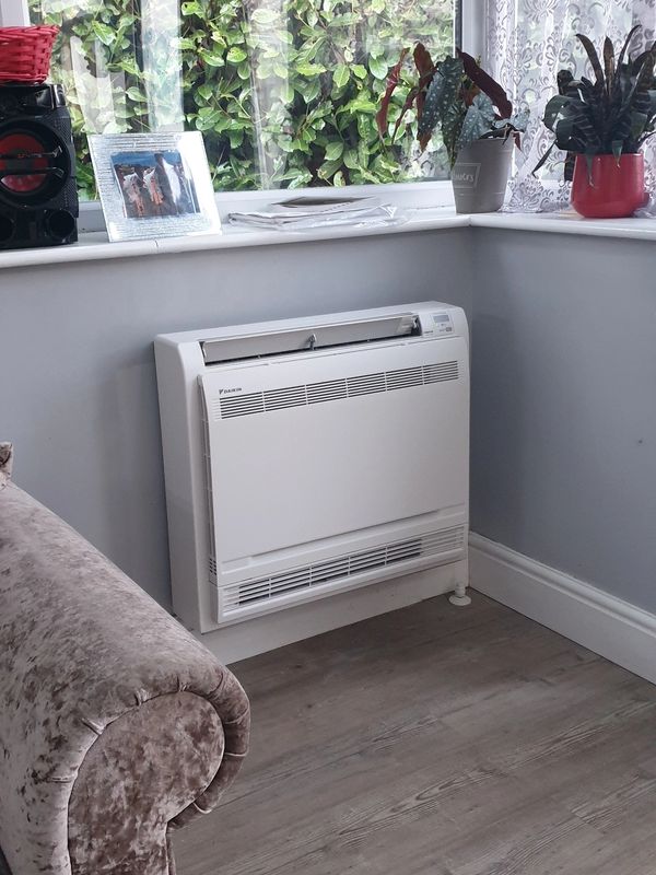 a 5kw Daikin Floor mounted unit installed in a living room