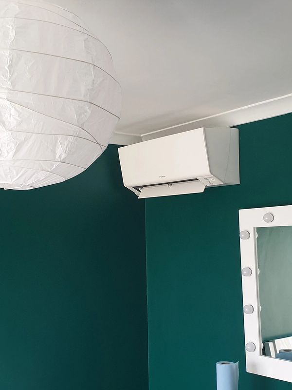 a 2.5kw Daikin Perfera wall mounted unit installed in a bedroom
