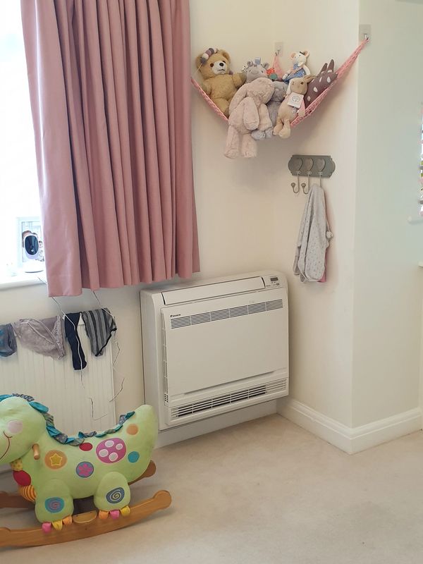 a 2.0kw floor mounted daikin unit installed in a kid's playroom