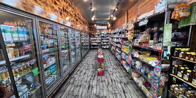 Cooler and dry goods groceries at F & D Meats in Virginia, MN.