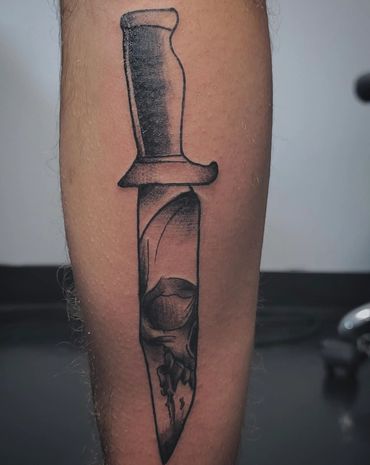 <img source='pic.gif' alt='anime tattoo ' />.