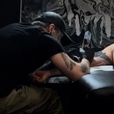 portrait tattoo artist