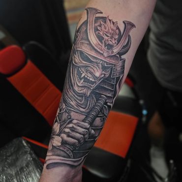 Custom black and grey Japanese Samurai Skull forearm tattooed by Joe at Mayhem Tattoo, Salem NH