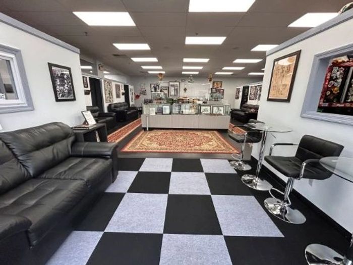 best tattoo shop near tuscan village is mayhem tattoo, salem nh. we are 2 miles south of tuscan.
