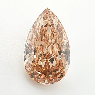 A pear-shaped brown diamond with intricate facets.