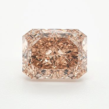 Radiant-cut peach diamond on a white background.
