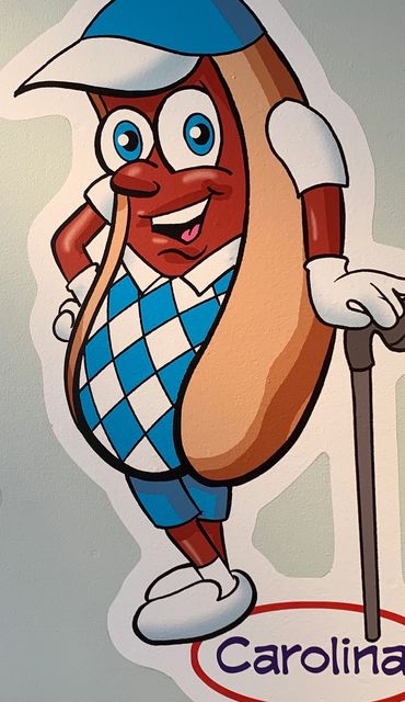 Yellow mustard, spicy beef chili & creamy cole slaw.