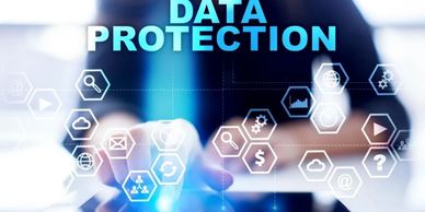 Data protection concept with digital icons and person using a device.