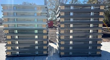 Stacks of powder coated well sheds