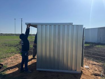Installing well shed roof
