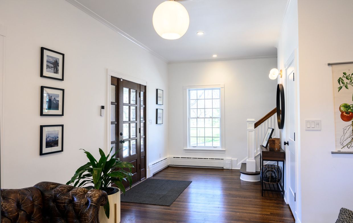 New front door with side panels lets in a lot of light. A much needed coat closet is added where the