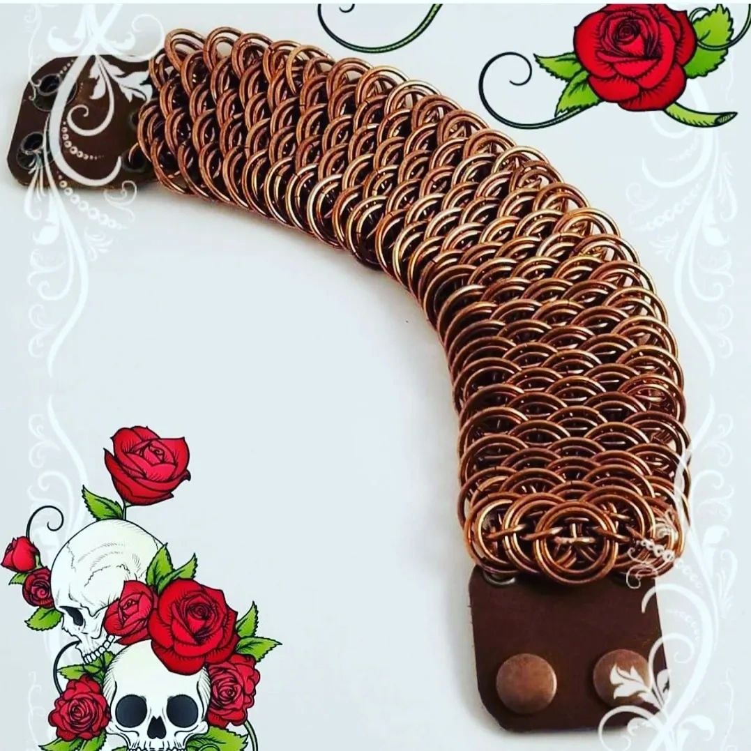 Copper with leather clasp