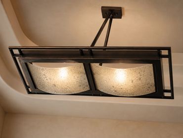 Custom fabricated metal chandelier built to bring bold architectural style and elegance