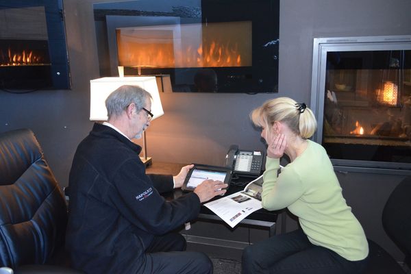 chimney professional having a consultation with a customer