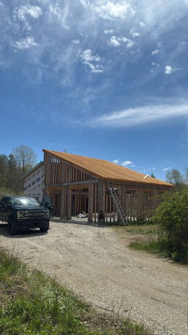 Custom timber framing and residential construction project by Blue Collar Vertical Industries.