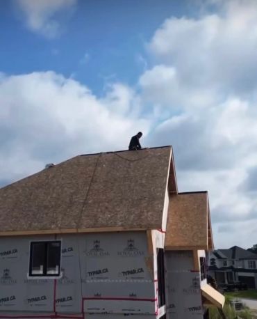 Residential roof framing and new home construction by Blue Collar Vertical Industries.