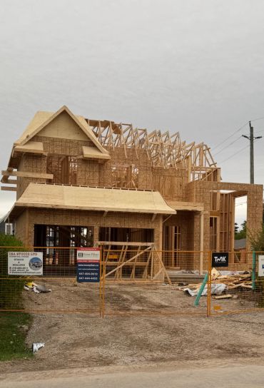 Custom home framing and structural carpentry for residential construction by Blue Collar Vertical Industries.