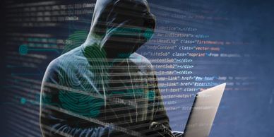 A hacker trying to penetrate a network.