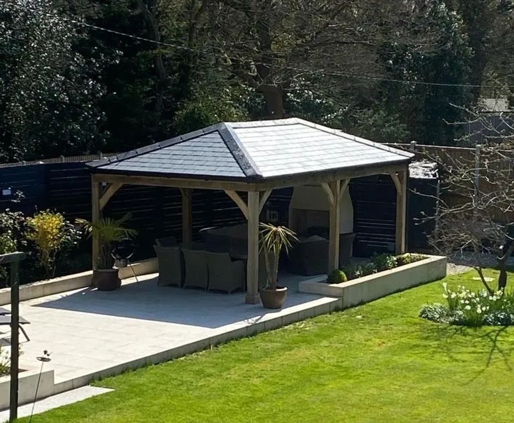 Solid oak framed garden pergoda complete with outdoor fireplace and porcelain tiles