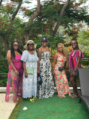 Group of women giving still for picture
