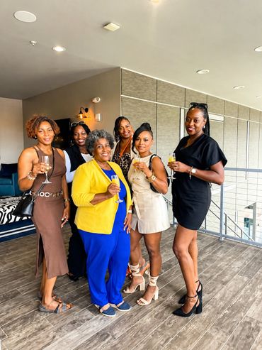 Group of women giving still for picture