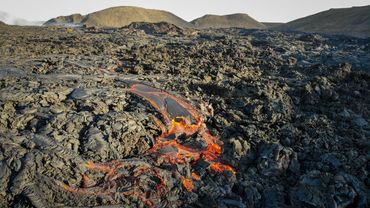 Lava flow solidifying and breaking