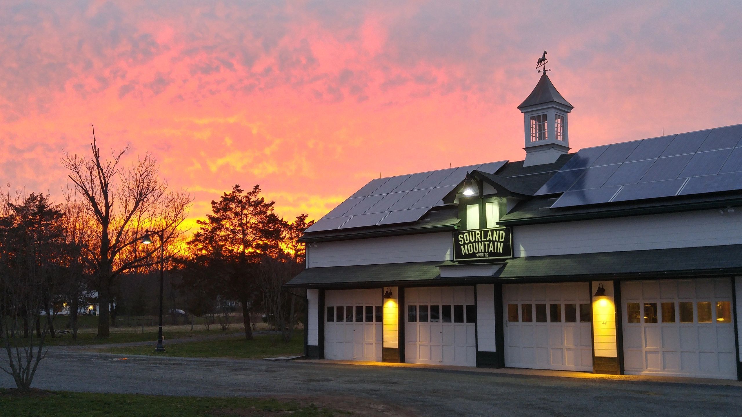 Distillery exterior, outfitted with solar panels