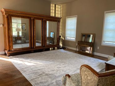 Beautiful Bridal Dressing Room with antique armoire and plenty of mirrors and natural light!