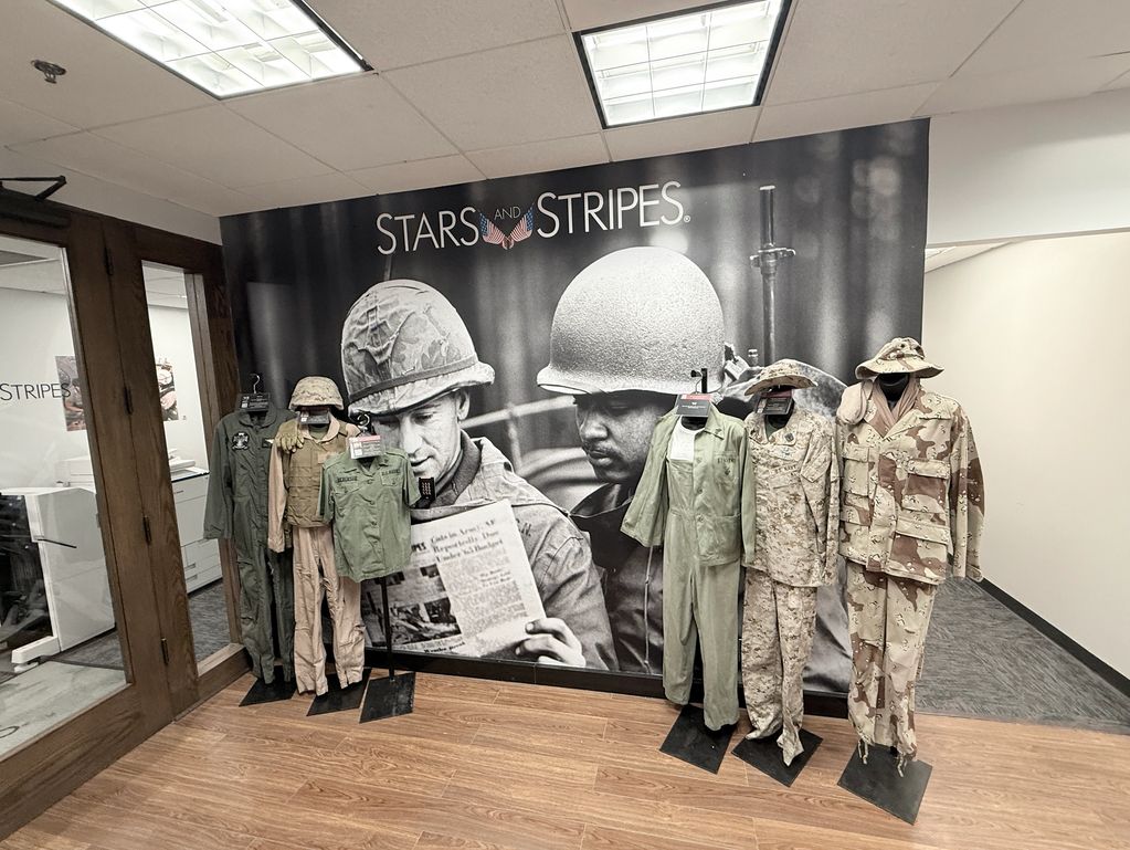 Woman Marine uniforms displayed at the Stars and Stripes Headquarters. We Are Marines