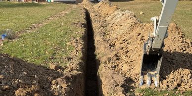 Trench for frost free water hydrant install, power line trench
Ann Arbor and Saline Michigan