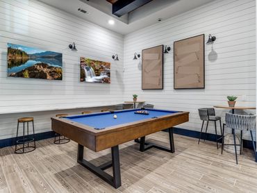 game room with billiards table