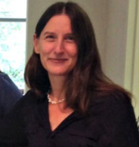 Headshot of receptionist and office manager Kelly