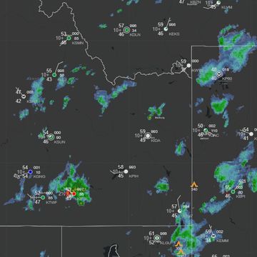 Regional weather radar shows scattered rain showers and storm activity.