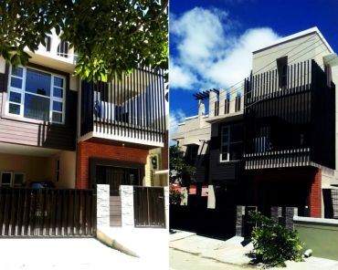 Modern two-story house with black vertical railings and a small garden in front.