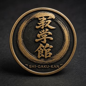 Round emblem with Japanese characters and "SHI-GAKU-KAN" inscription.