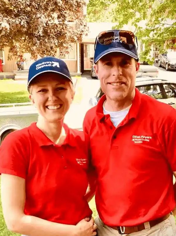 image of husband and wife window cleaning team.