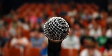 microphone in front of a crowd