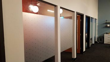 Dusted vinyl plot cut for interior office window design and privacy.