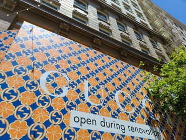 Temporary Wall Graphics on adhesive vinyl with luster lamination for Gucci in the South West Loop