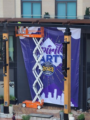 Grand format outdoor banner for an airline appreciation event at Wrigley Field.