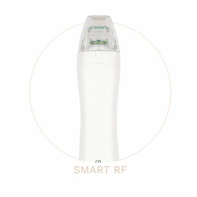 Close-up of a white Smart RF beauty device with a transparent tip.