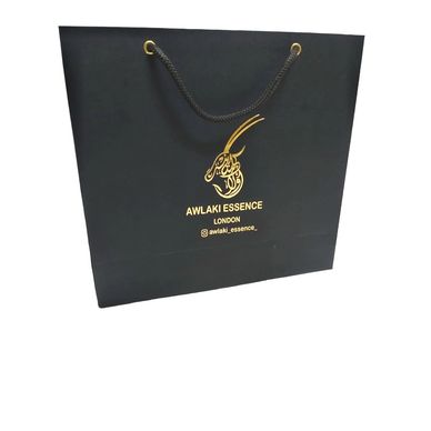 Matte black paper carry bag for store shop showroom boutique with customization in gold foiling.
