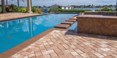 Brick_Paver_Community_Pool_Decks_cleaned_and_
sealed_sealing_brick_paver_pool_decks_at_resorts_and_commercial_pool_decks