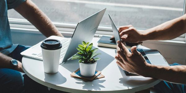 Business efficiency check-in meeting to track progress and refine improvement strategies.