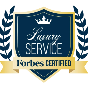 Forbes Certified Luxury Service badge with crown and laurel.