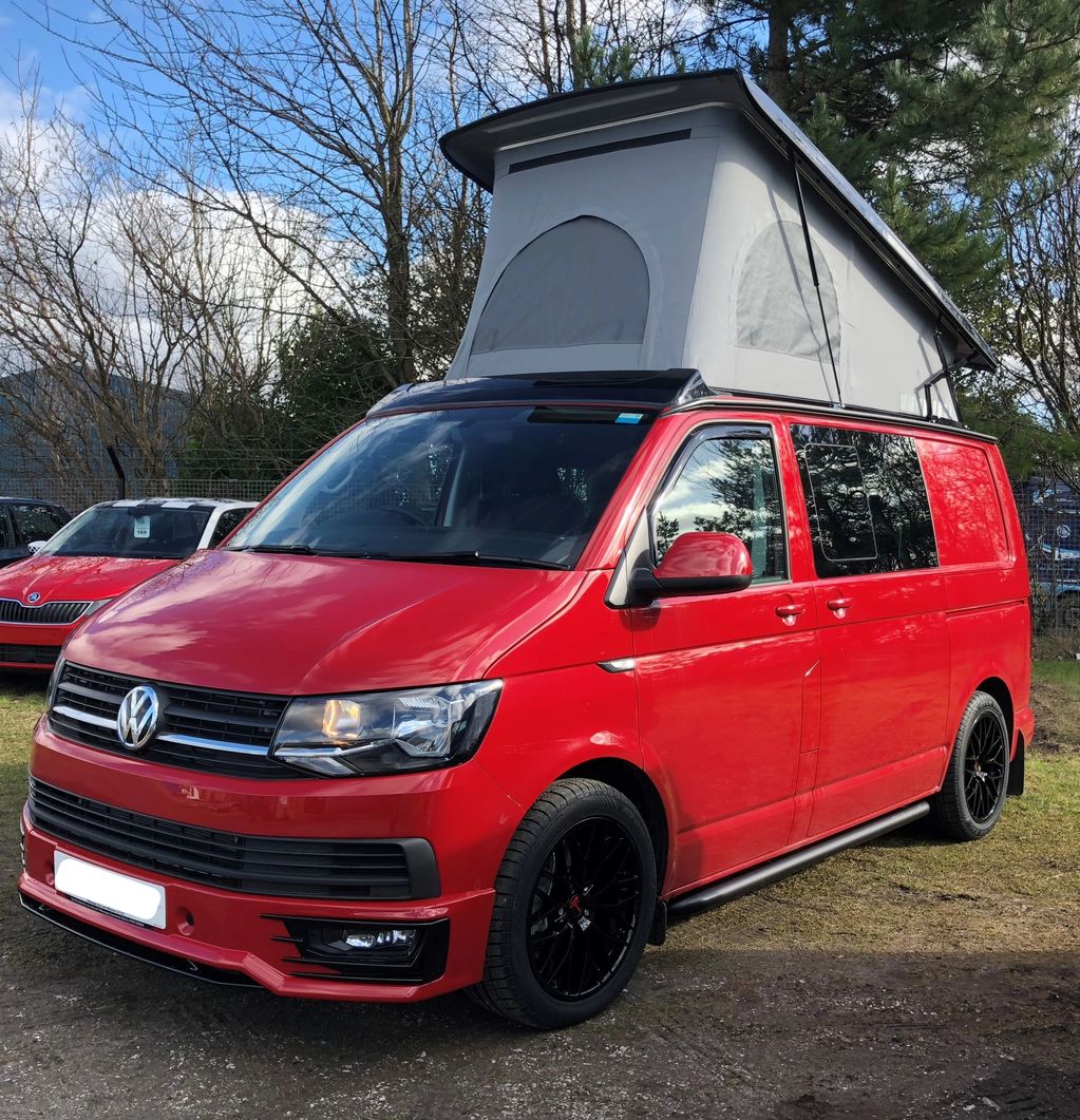 Red Volkswagen campervan with SCA elevating roof 